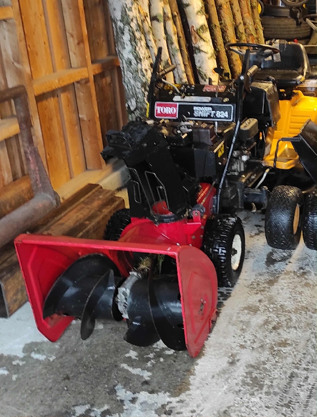 Feilsøke og reparere snøfreser