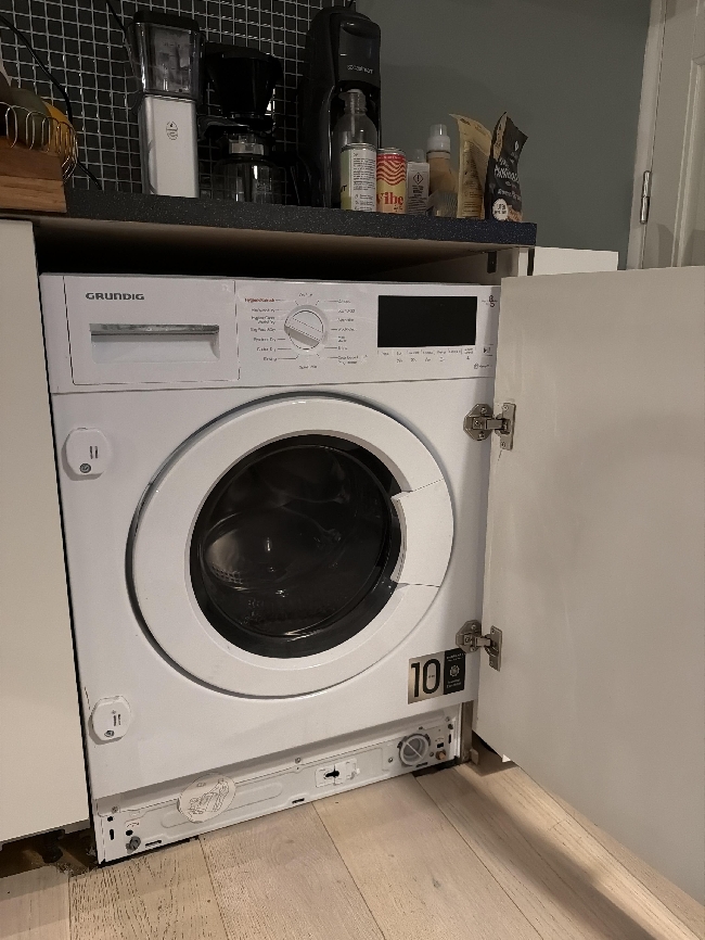 Løfte integrert vaskemaskin