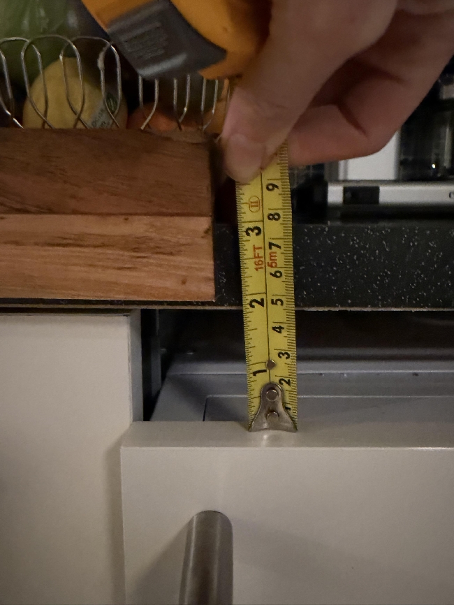 Løfte integrert vaskemaskin