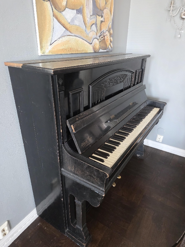 Bære ut piano og kjøre det bort