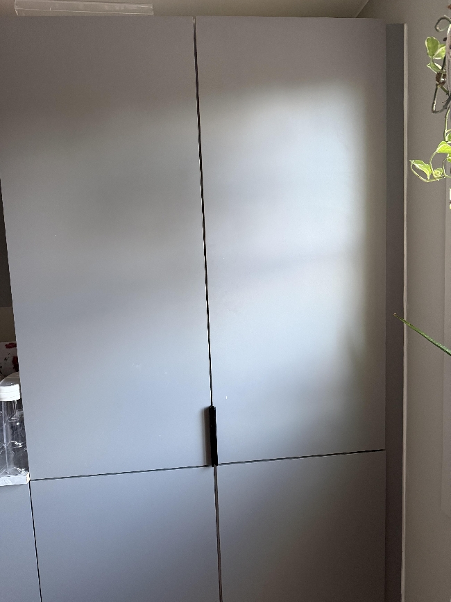 Fixing the fridge n freezer door