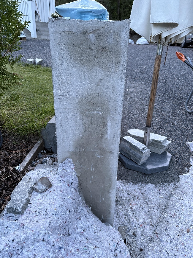 Siste lag med fiberpuss på portstolper