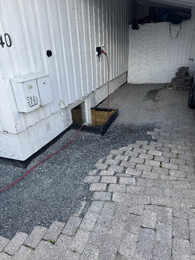 Legge tilbake belegningsstein