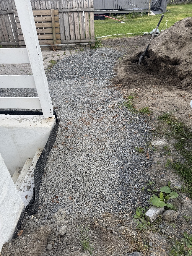 Legge tilbake belegningsstein